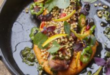 Gegrilde pulpo met paprikahumus en gepofte quinoa
