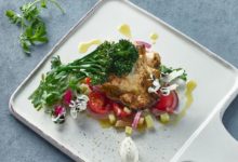 Kip met broccolini en look